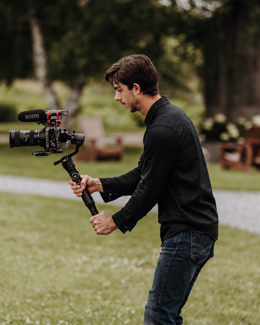 Jack Albert filming a wedding with a gimbal camera